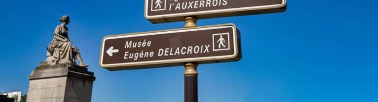 road sign for museum Delacroix in Paris